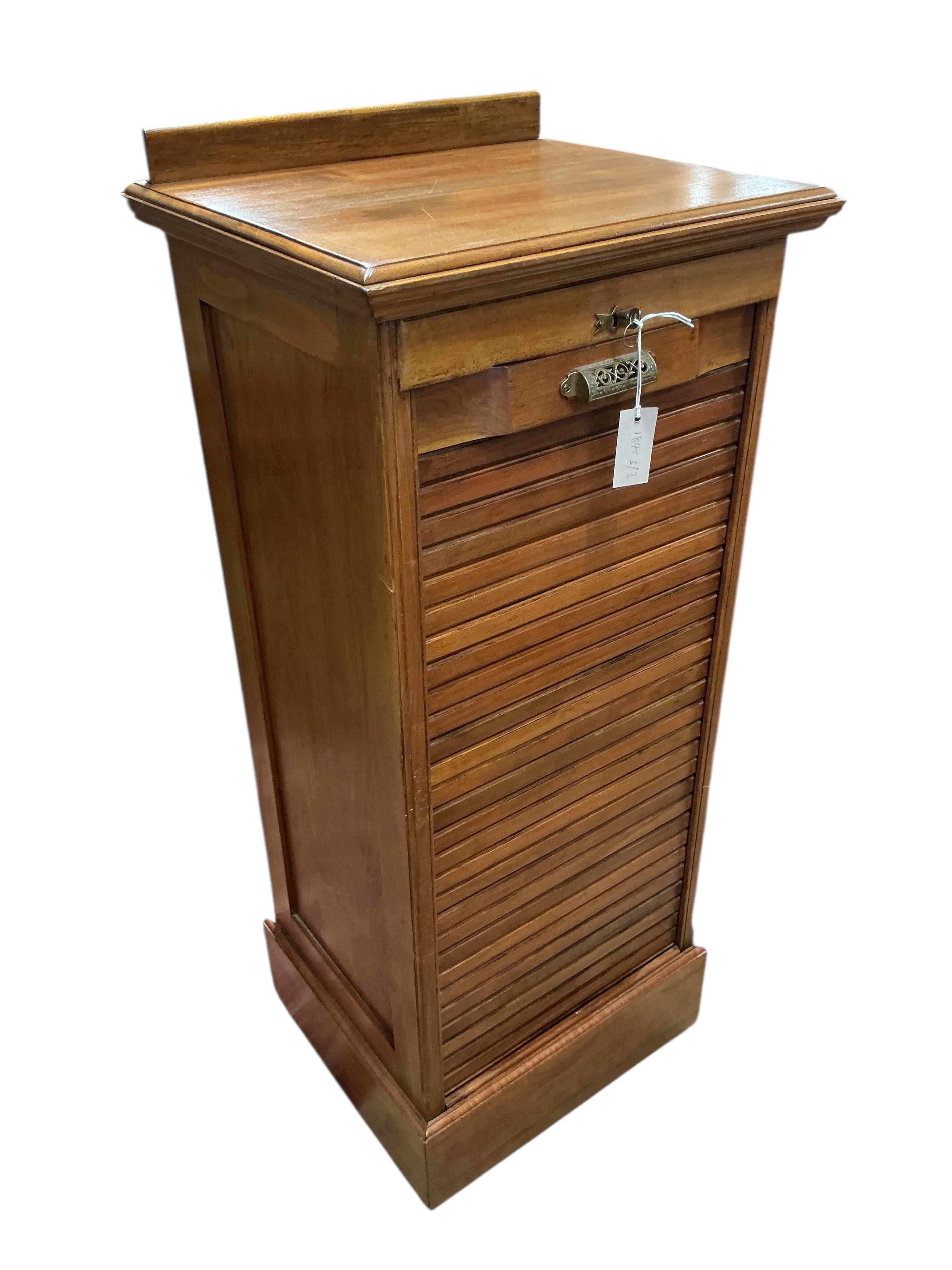An early 20th century walnut tambour filing cabinet, width 50cm, depth 45cm, height 124cm